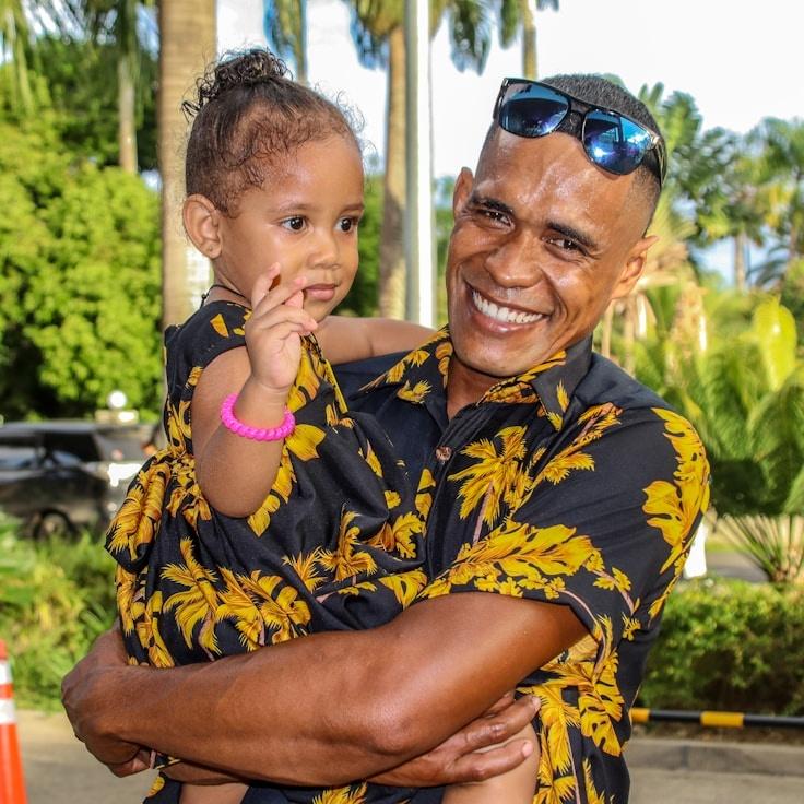 Kaveri Mehta, Lead Design Curator at PerchLatticeSolar, reviewing corporate floral arrangements